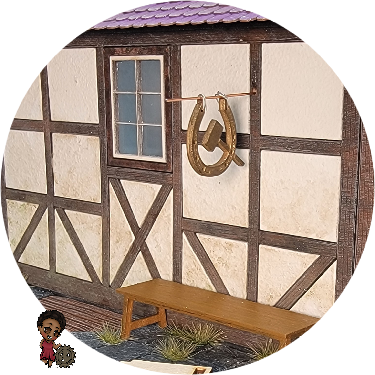 Ein Hufeisen_Schild, das im Wind schwingt. Ein BewegtBauen-Bausatz
